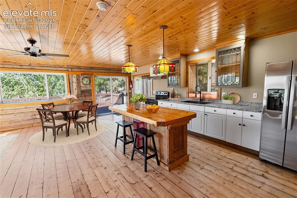 Image 24 of 50: ADU Living & Kitchen - Virtually Staged