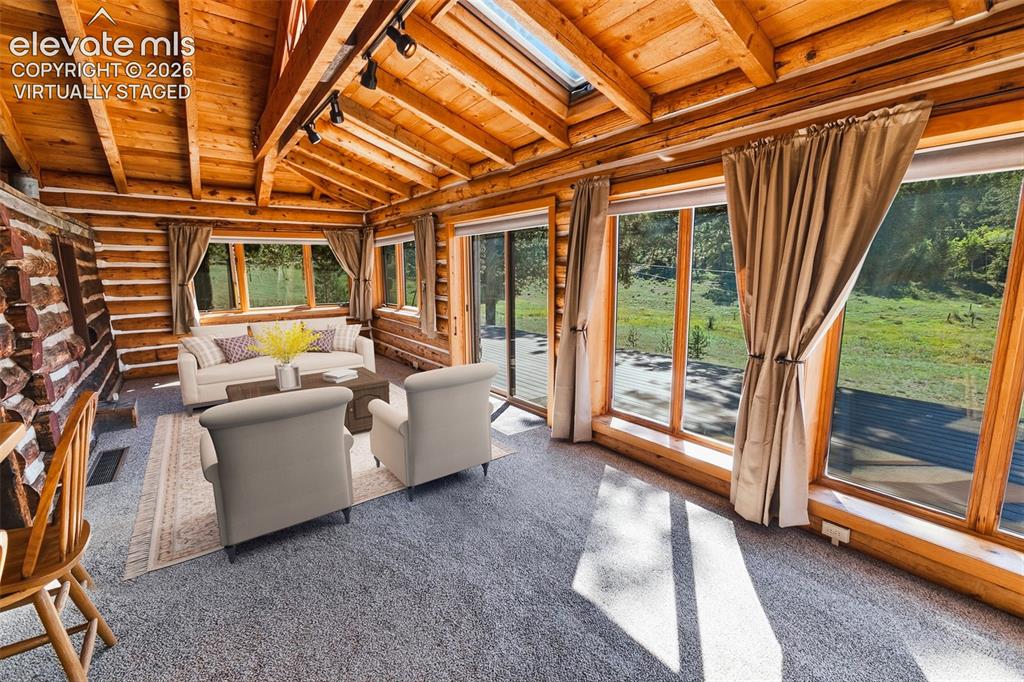 Image 8 of 50: Main House Living - Virtually Staged