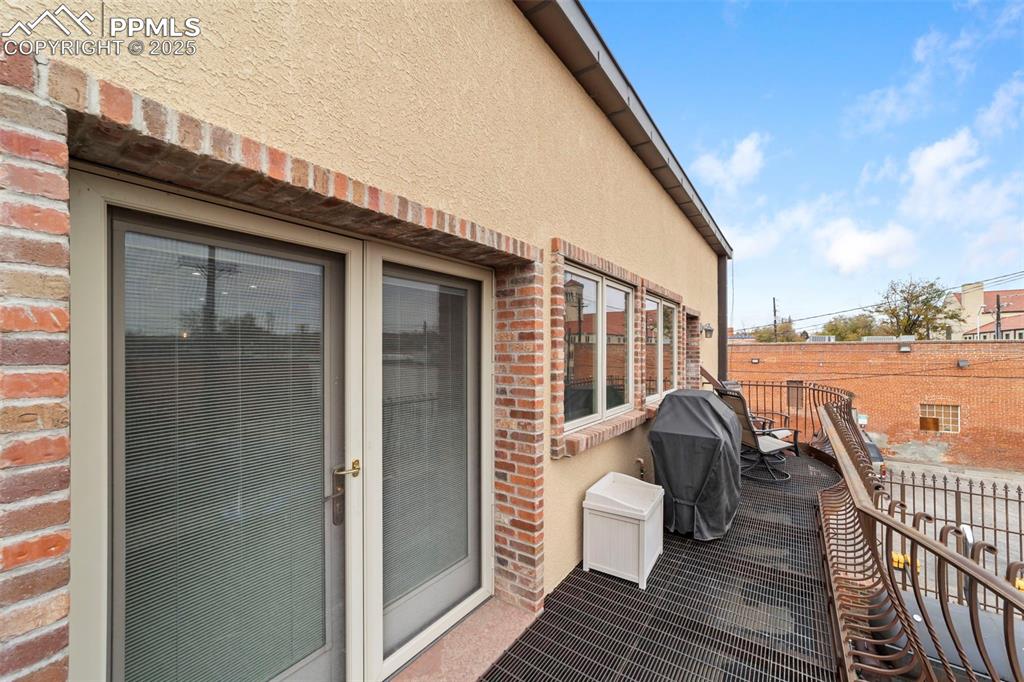 Image 32 of 40: Terrace featuring area for grilling and gas line so you are not lugging in 