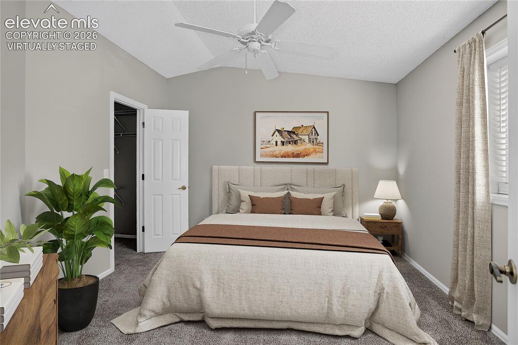 Image 23 of 44: Primary Bedroom - Virtually Staged with King Bed