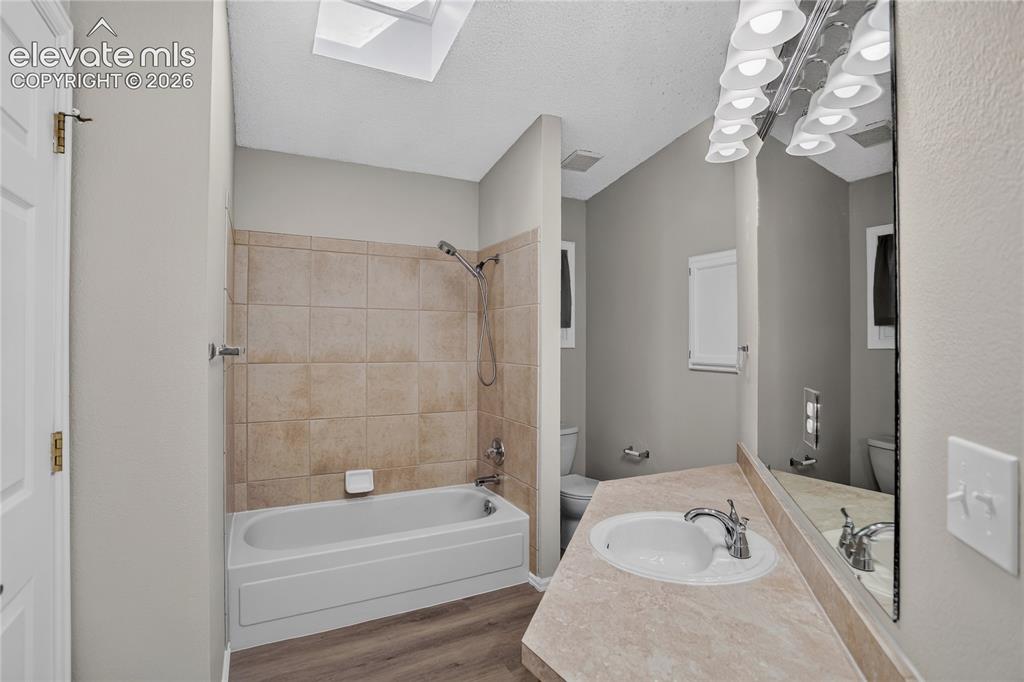 Image 28 of 44: Upper Level Full Hall Bath