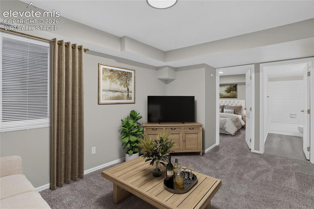 Image 36 of 44: Basement Family Room - Virtually Staged