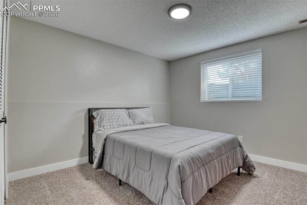 Image 37 of 49: Bedroom