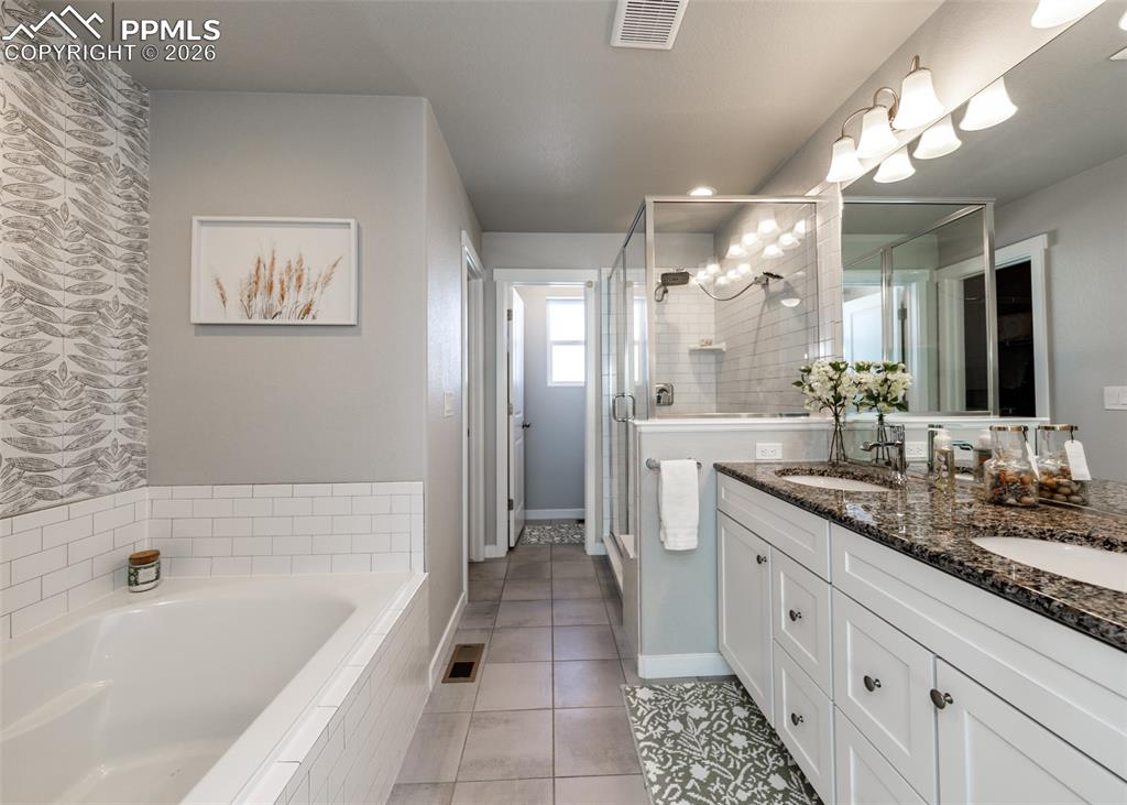 Image 19 of 50: Master Bathroom