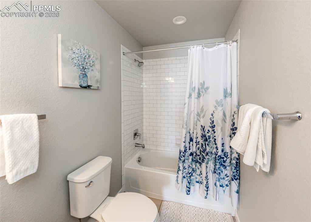 Image 30 of 50: Upstairs Hall Bath