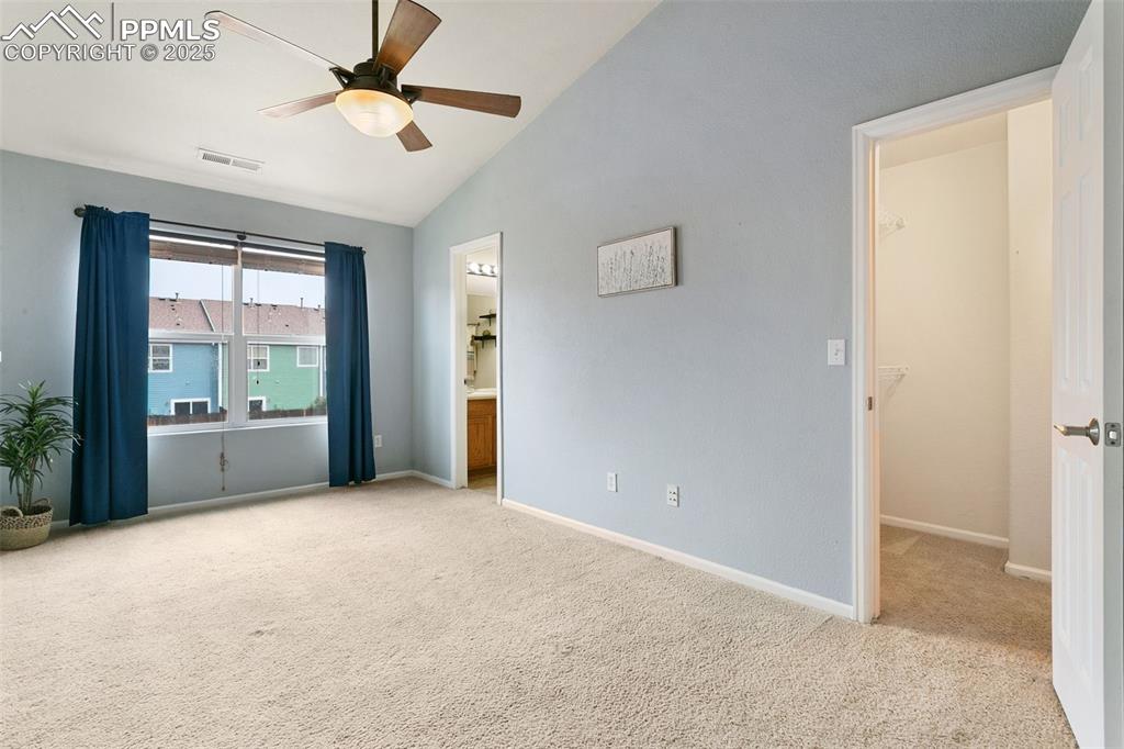 Image 14 of 26: Primary BR with walk-in closet on the right