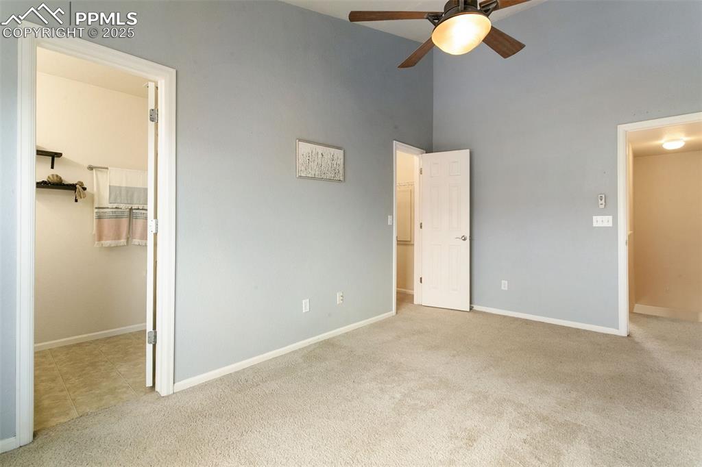 Image 16 of 26: Primary BR with en-suite bathroom on the left