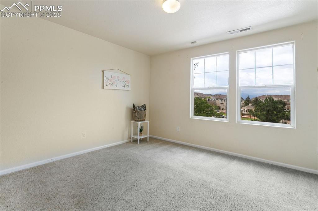 Image 18 of 26: 2nd BR upstairs w/ amazing views