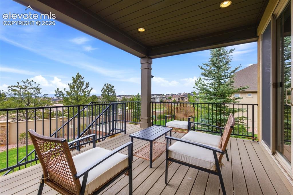 Image 20 of 50: Living Room & Primary Bedroom Walkout to Covered Composite Patio