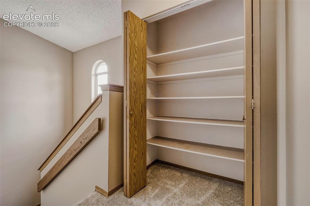 Image 17 of 32: Large linen/storage closet
