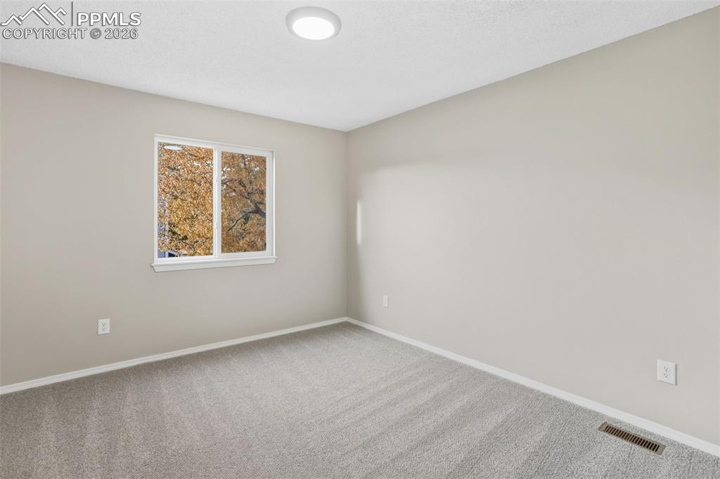 Image 25 of 36: 1 of 4 upper level bedrooms