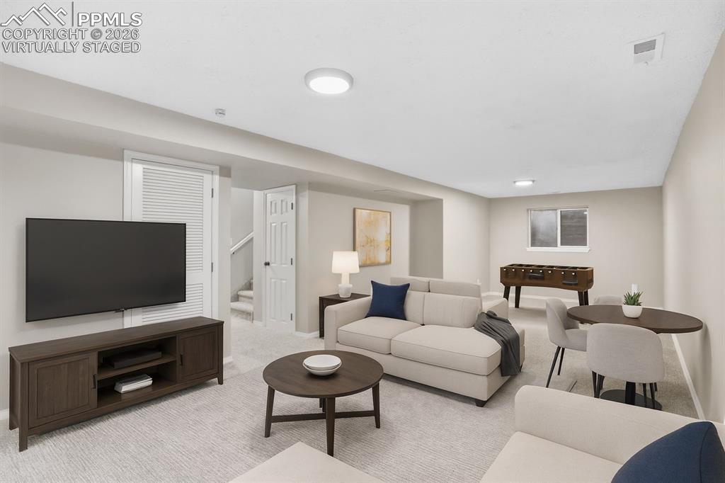 Image 9 of 36: Finished basement with a bedroom, full bathroom and living room. virtually 