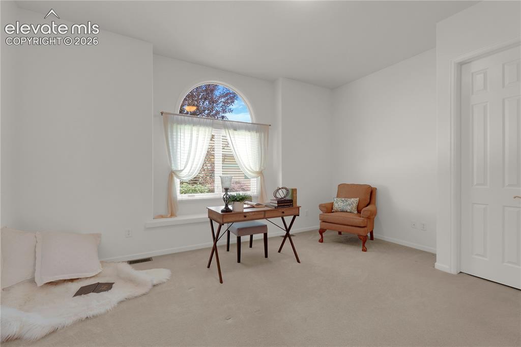 Image 16 of 35: 2nd bedroom/office on main level