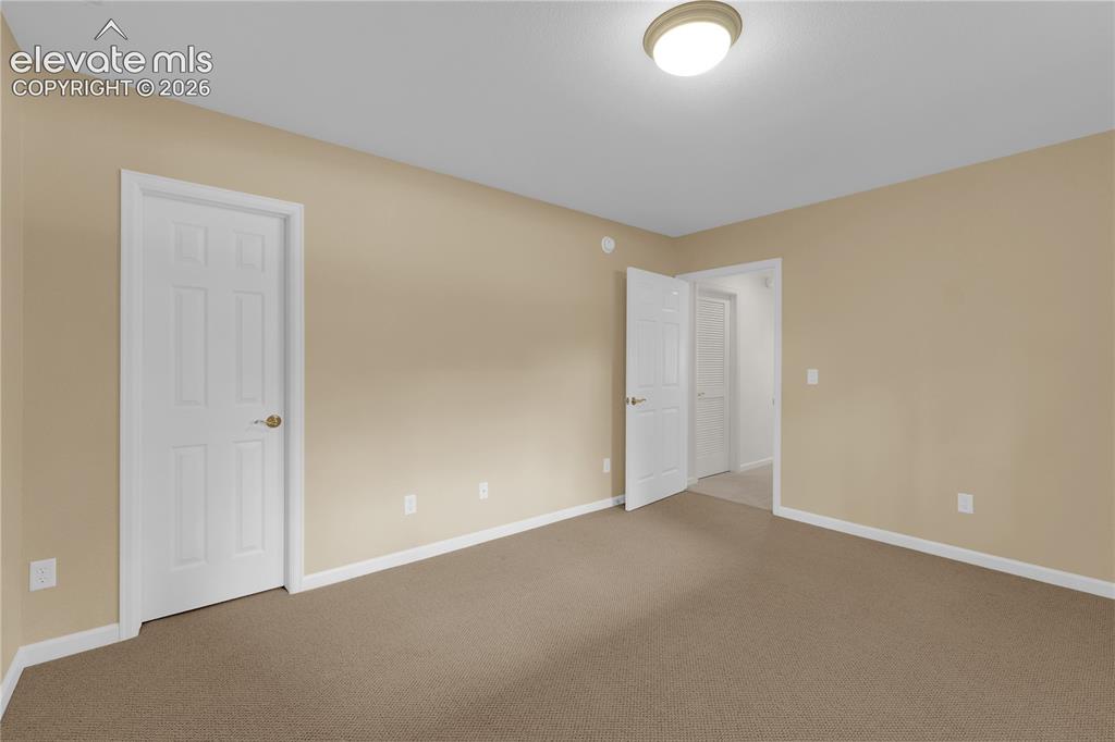 Image 26 of 35: Basement bedroom
