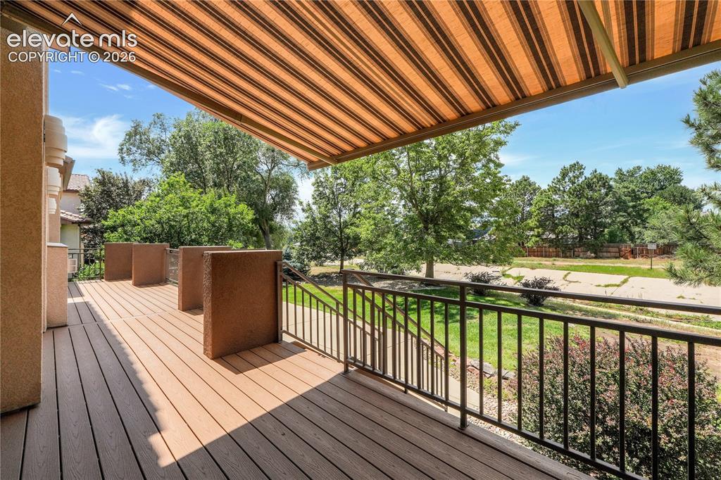Image 27 of 35: Walk out to covered deck
