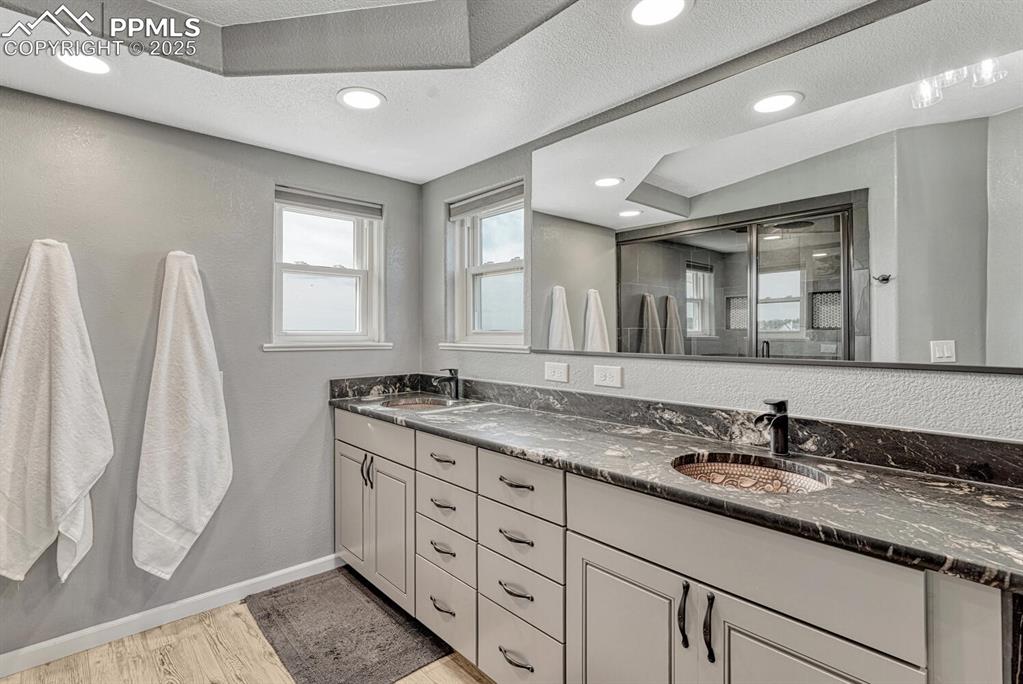 Image 27 of 50: Primary bathroom with double sinks, 5 piece bathroom suite