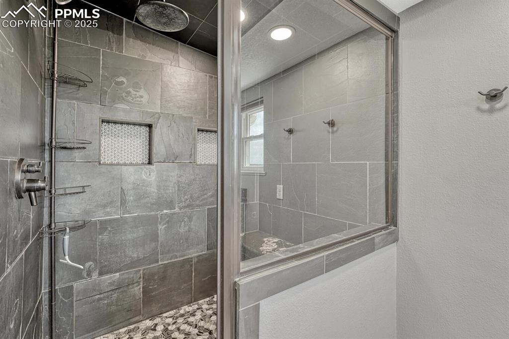 Image 28 of 50: Primary bathroom with double sinks, 5 piece bathroom suite