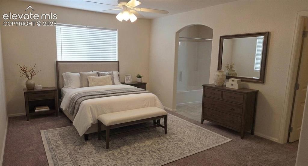 Image 5 of 23: Primary bedroom with full private bath