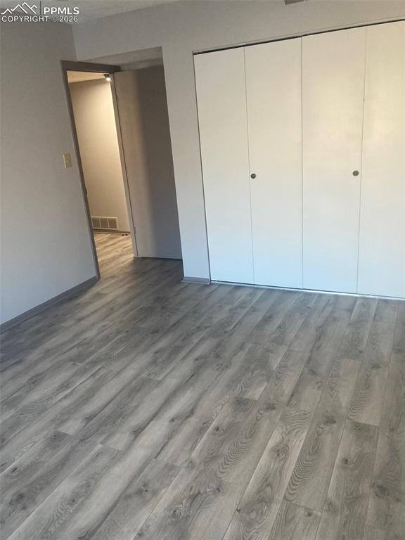 Image 14 of 19: 1st bedroom upstairs