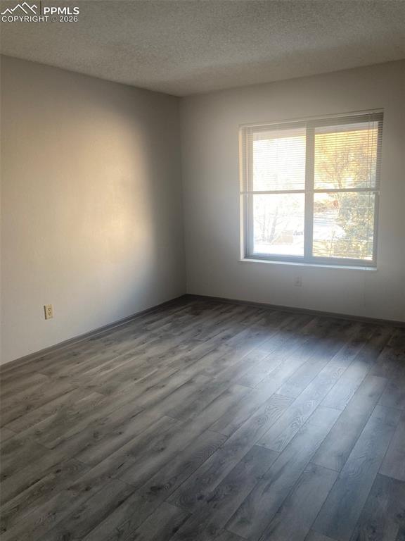 Image 15 of 19: 2nd bedroom larger with walk out to west facing deck