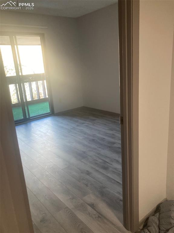 Image 16 of 19: 2nd bedroom larger with walk out to west facing deck