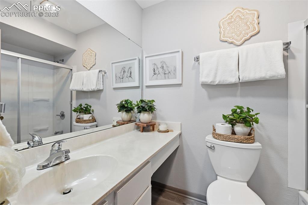 Image 22 of 28: Upper level bedroom Balcony with west facing mountain views