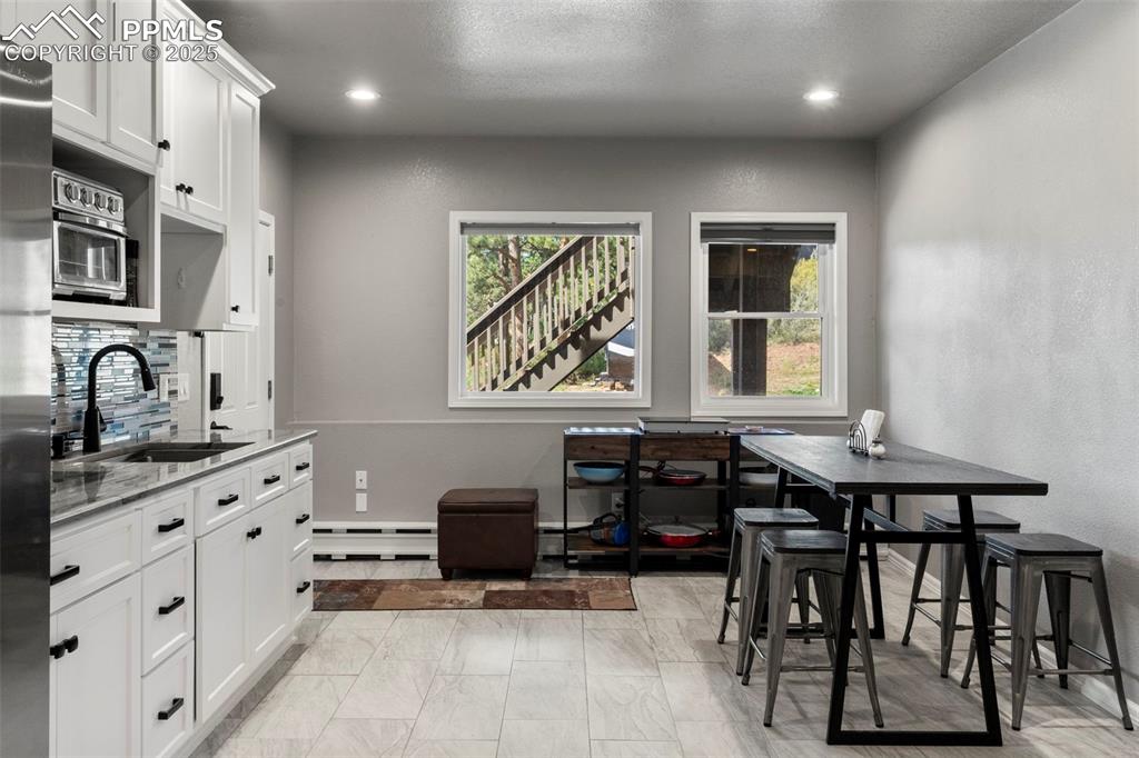 Image 25 of 46: Downstairs mother in law kitchen