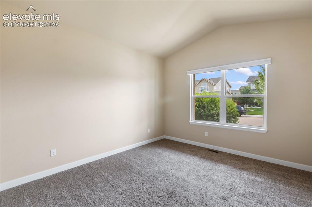 Image 16 of 35: Frosted glass shower door and Large Walk-In Closet