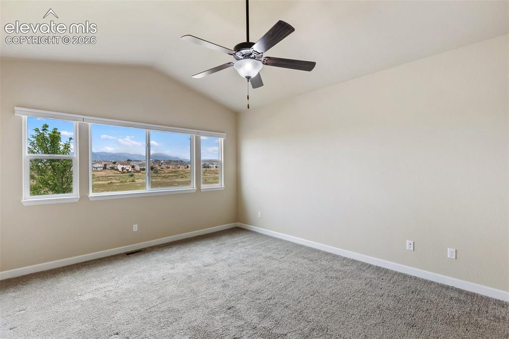 Image 18 of 35: Front Bedroom on the main level with a Closet or an Office