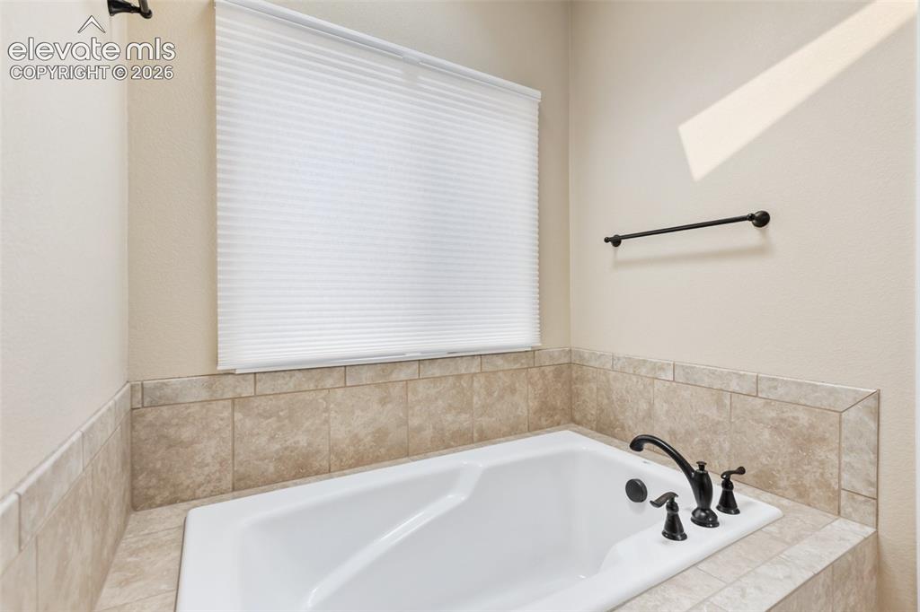 Image 19 of 35: Main level bathroom