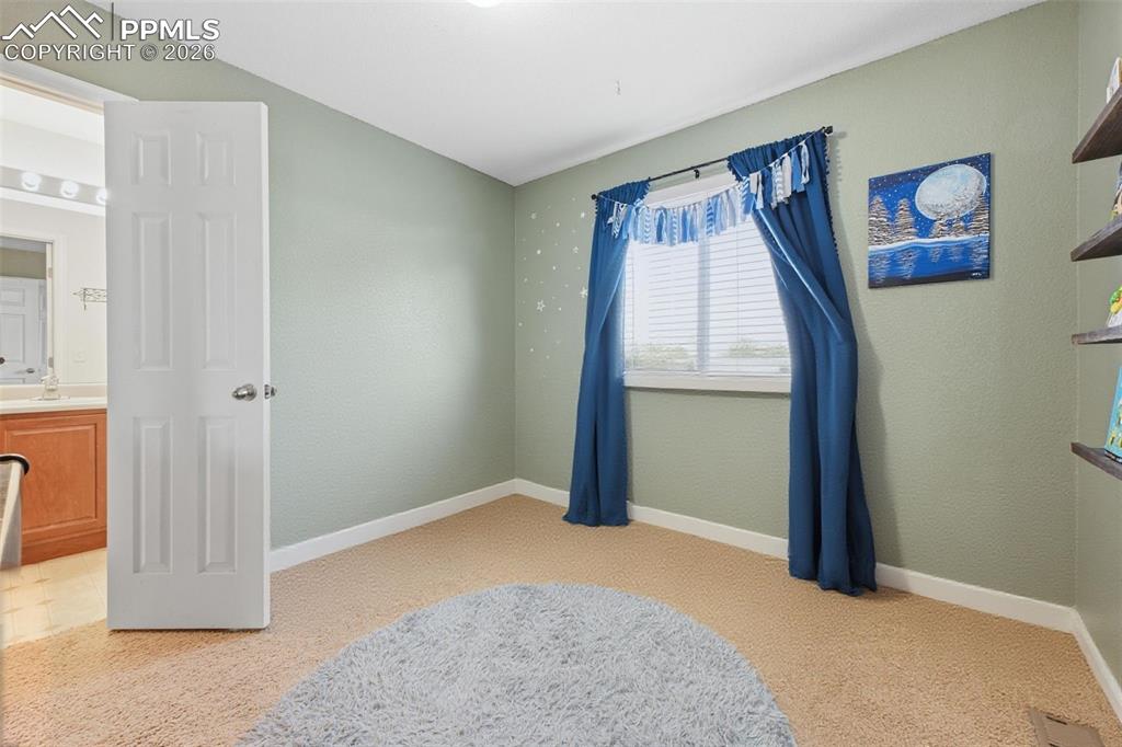 Image 23 of 34: Bedroom