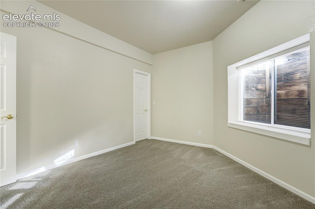 Image 41 of 48: Basement Bedroom with walk in closet