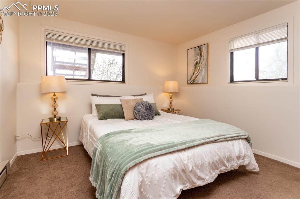 Image 10 of 39: Main bedroom on the lower level. Unoccupied unit 1903