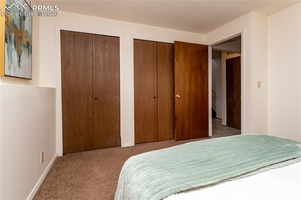 Image 11 of 39: Main Bedroom has lots of closet space. Unoccupied unit 1903