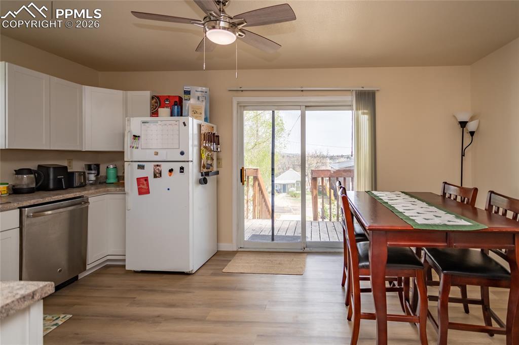 Image 21 of 39: Dining and Kitchen are on the east side of the Duplex.  Occupied unit 1905