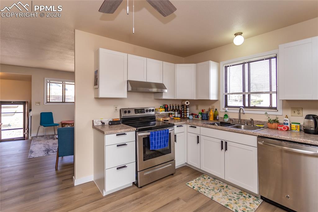 Image 23 of 39: Lots of windows in both units!  Occupied unit 1905