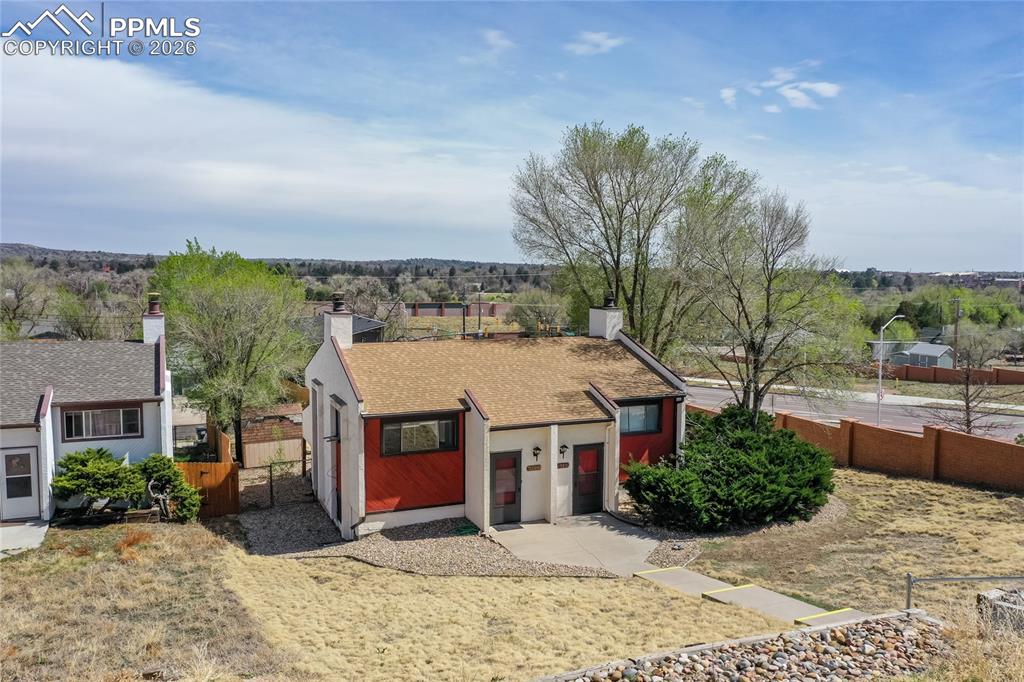 Image 32 of 39: Front view of Duplex. Front of Duplex faces west. 