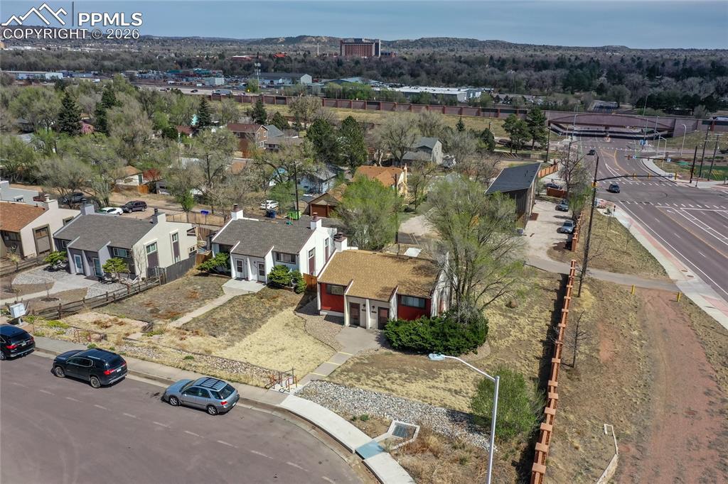 Image 36 of 39: Duplex sits at the end of a cup-de-sac. The Mesa Springs Greenway is minute