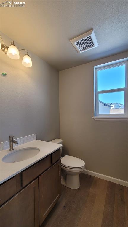 Image 10 of 35: Powder Room, located on the main level! Please, excuse our dust as this hom