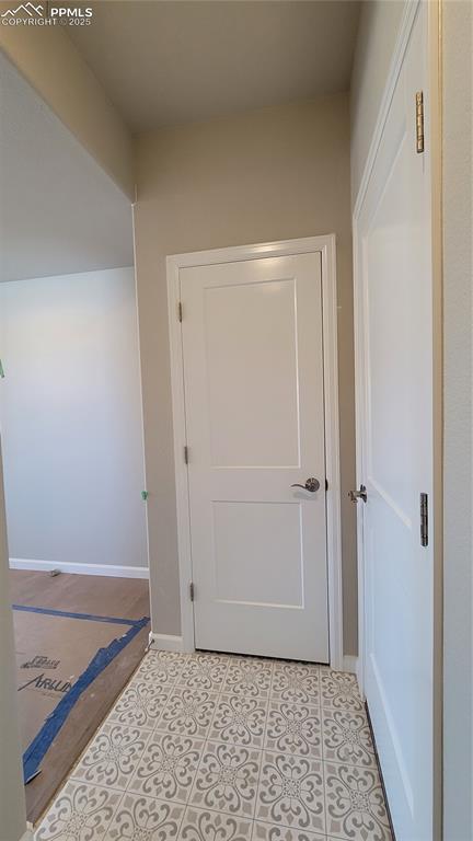 Image 12 of 35: Coat closet located off the garage!