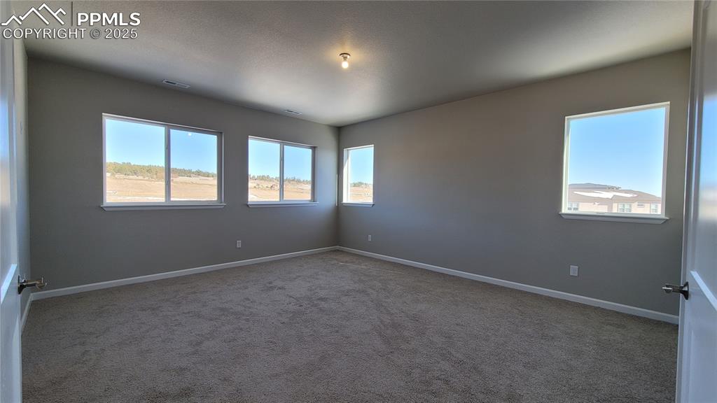 Image 16 of 35: Master Bedroom