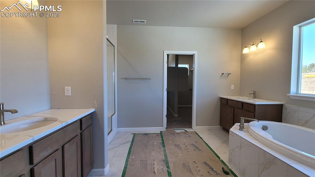 Image 18 of 35: Master Bathroom