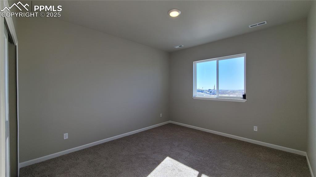 Image 26 of 35: Bedroom