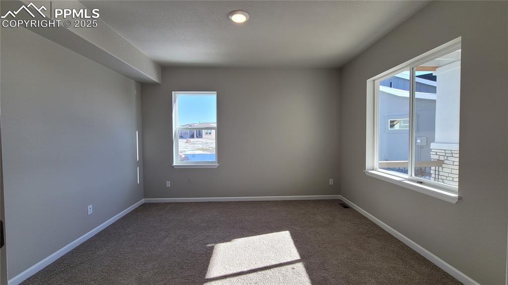 Image 9 of 35: Main level study with French Doors! Please, excuse our dust as this home is