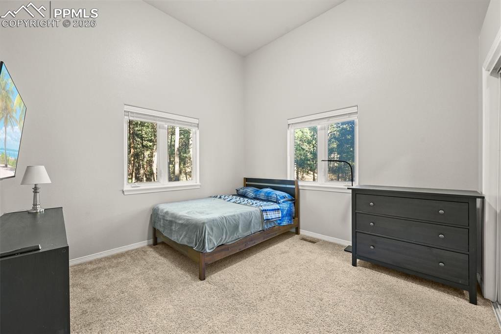 Image 25 of 47: Main level bedroom