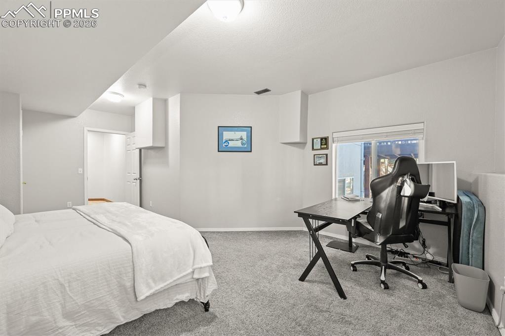 Image 34 of 47: Basement Bedroom