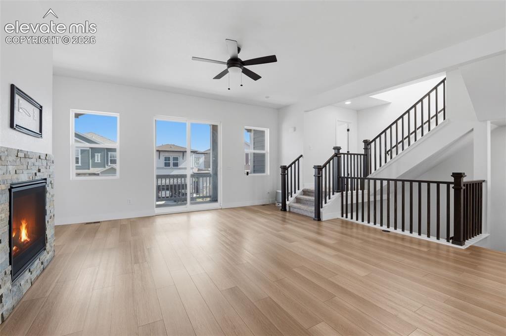 Image 11 of 31: Living Space and Balcony 