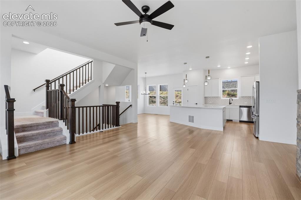 Image 5 of 31: 2nd story entertaining space