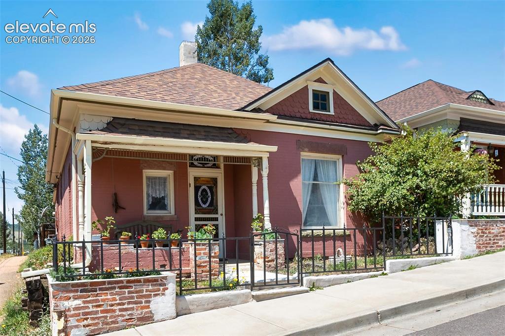 Caption: Restored Victoria with beautiful curb appeal. 