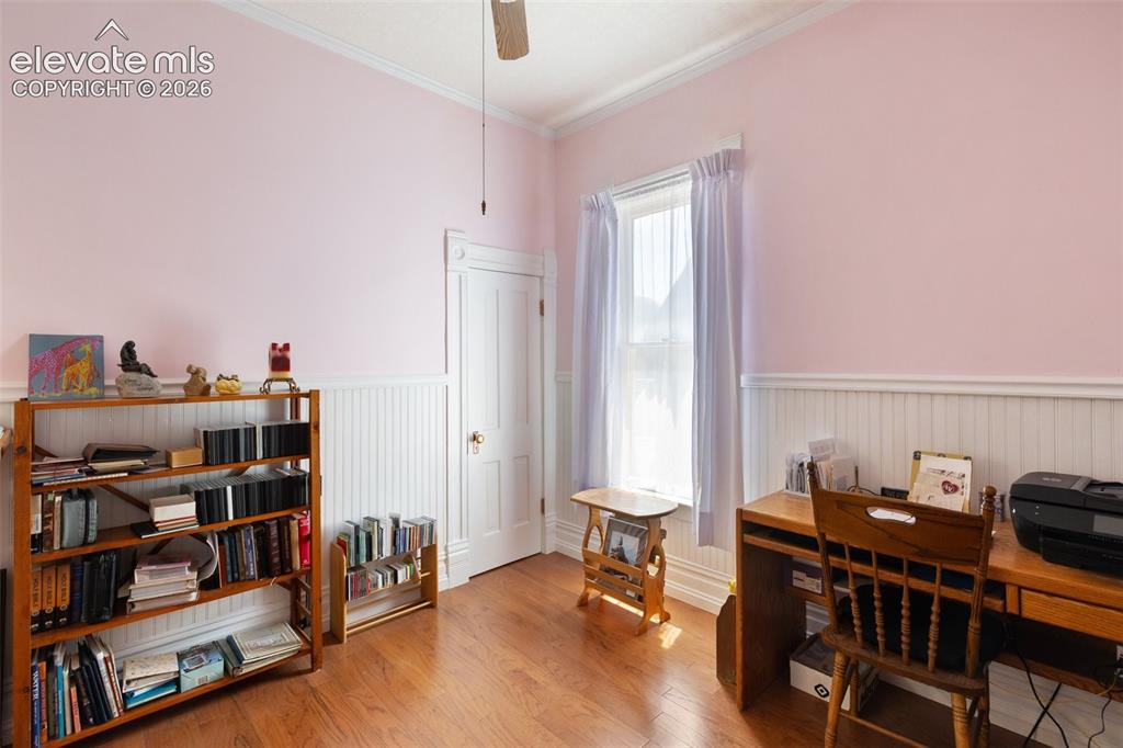 Image 10 of 29: Closet space, ceiling fan, and detailed touches bring out the character of 